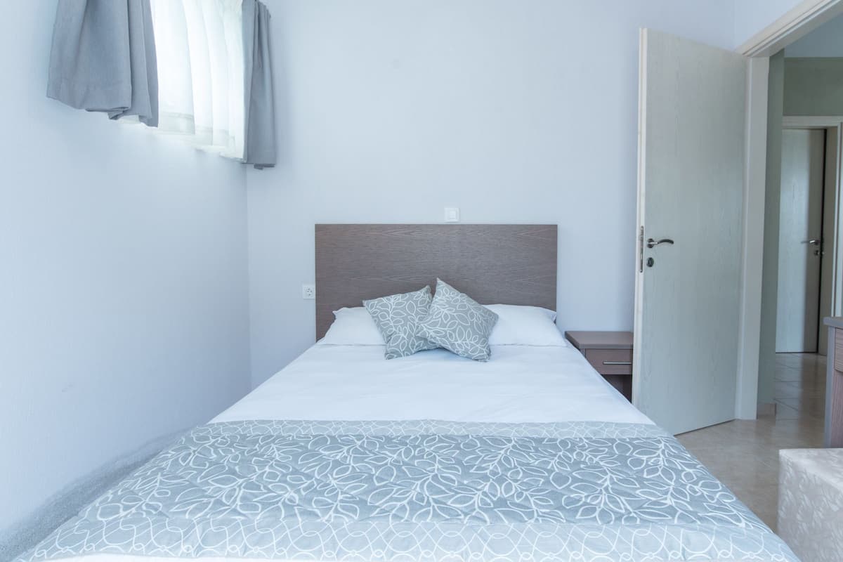 Appartement familial, 2 chambres, fumeur | 2 chambres, rideaux d’obscurcissement, système d’insonorisation