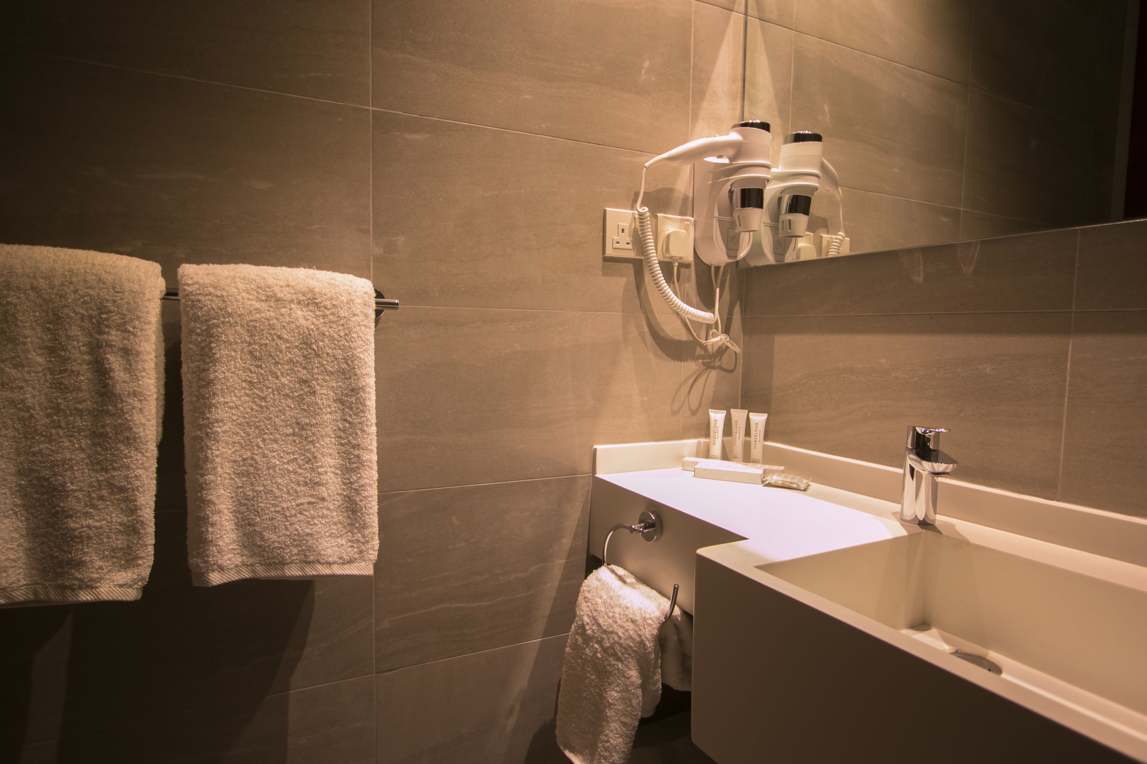 shower, free toiletries, hair dryer, slippers