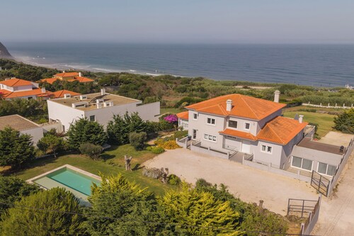 Oceanfront Villa at Praia Grande · Heated Pool