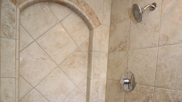 Bathtub, eco-friendly toiletries, hair dryer, towels