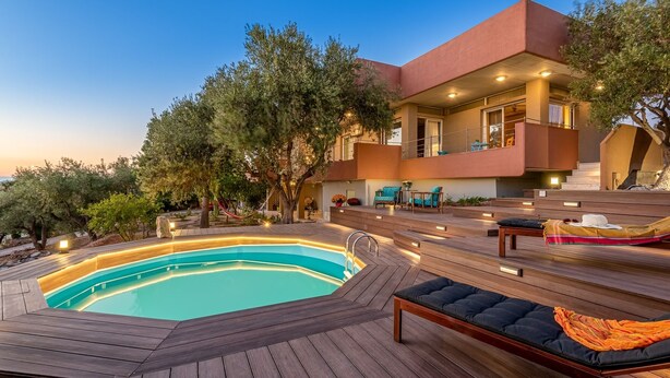 A modern two-story house with a swimming pool, outdoor seating, and a balcony. - Lagonisi Villa Afroditi (Saronikos)