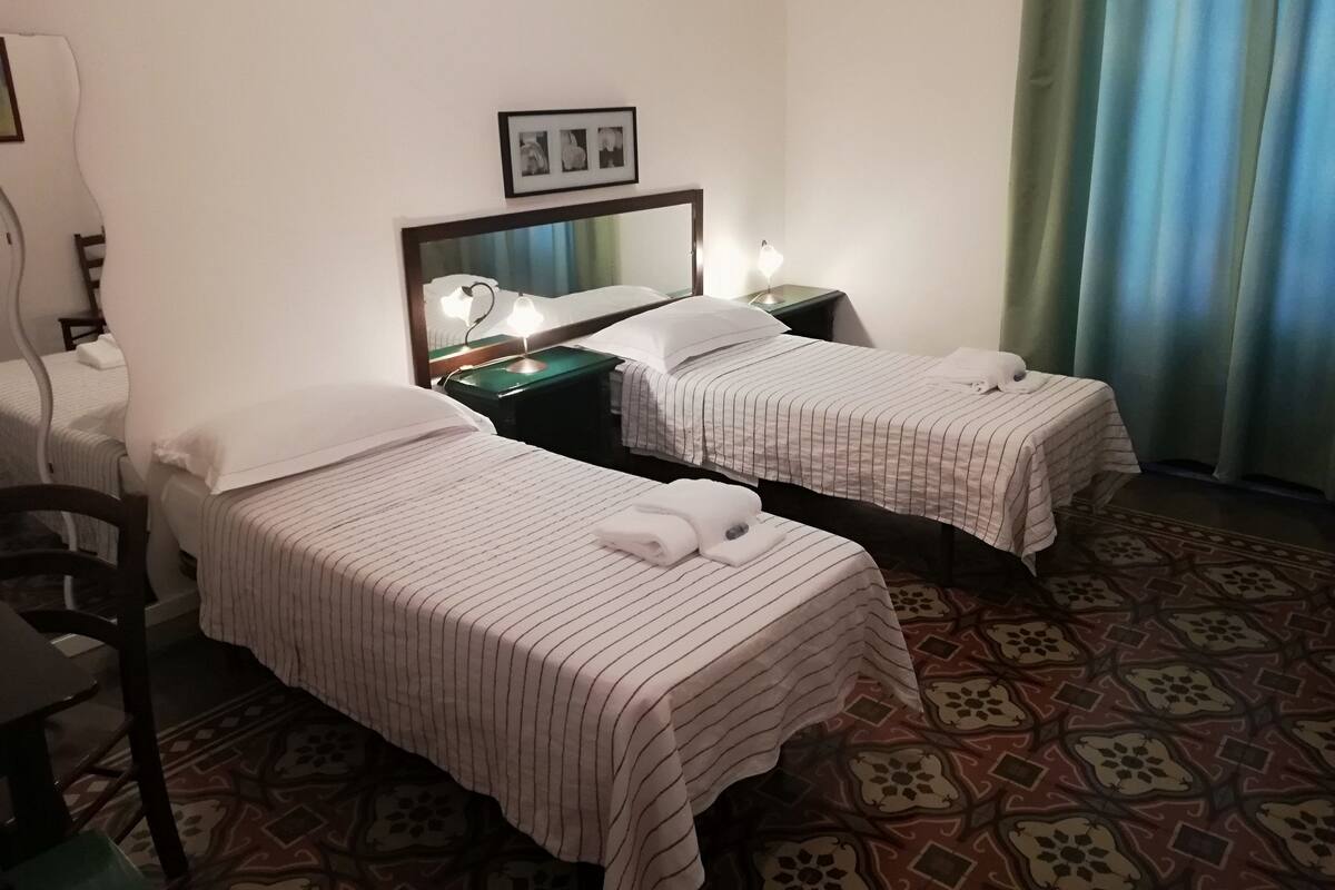 1 bedroom, desk, iron/ironing board (on request), cribs (free)