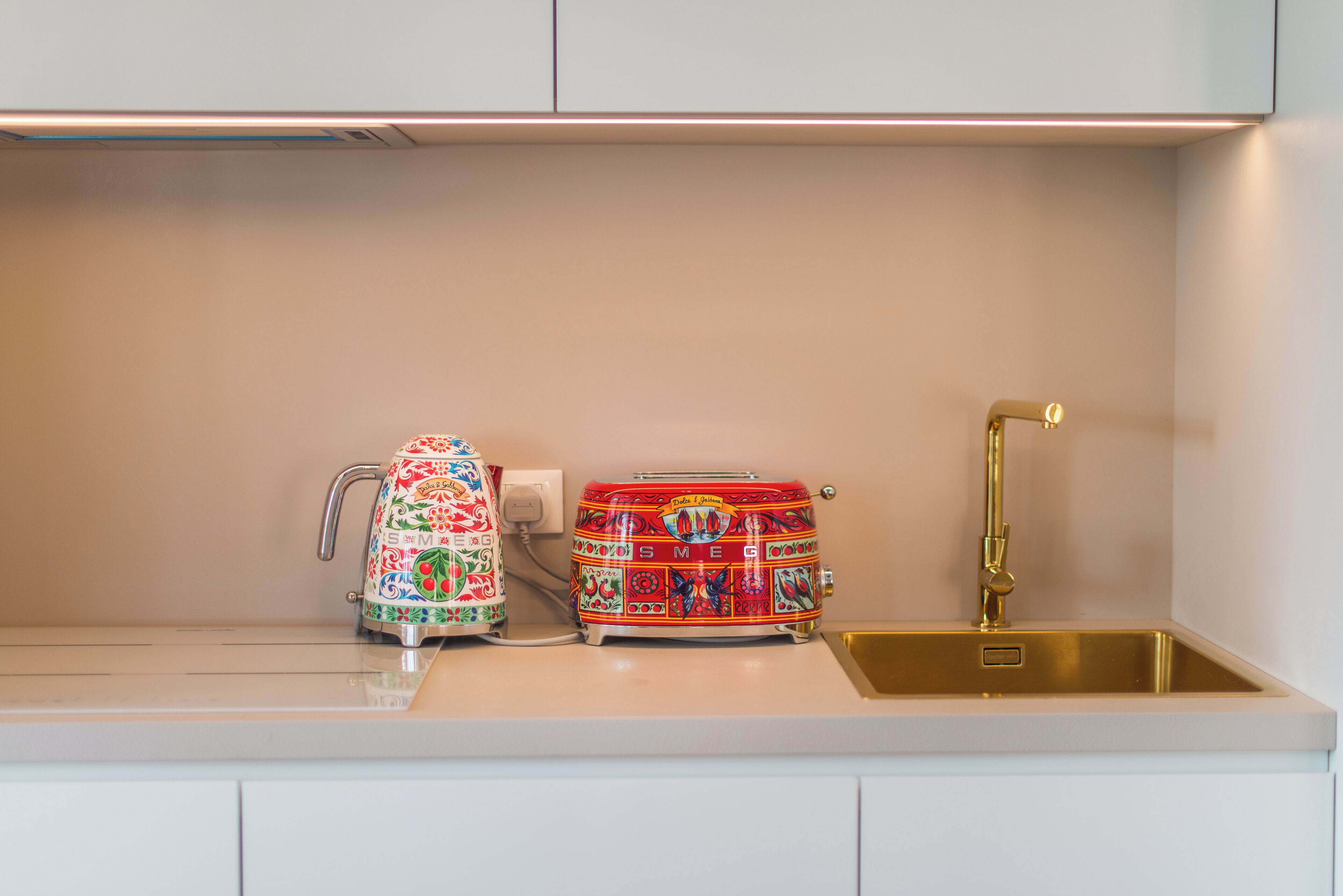 espresso maker, coffee/tea maker, electric kettle, high chair