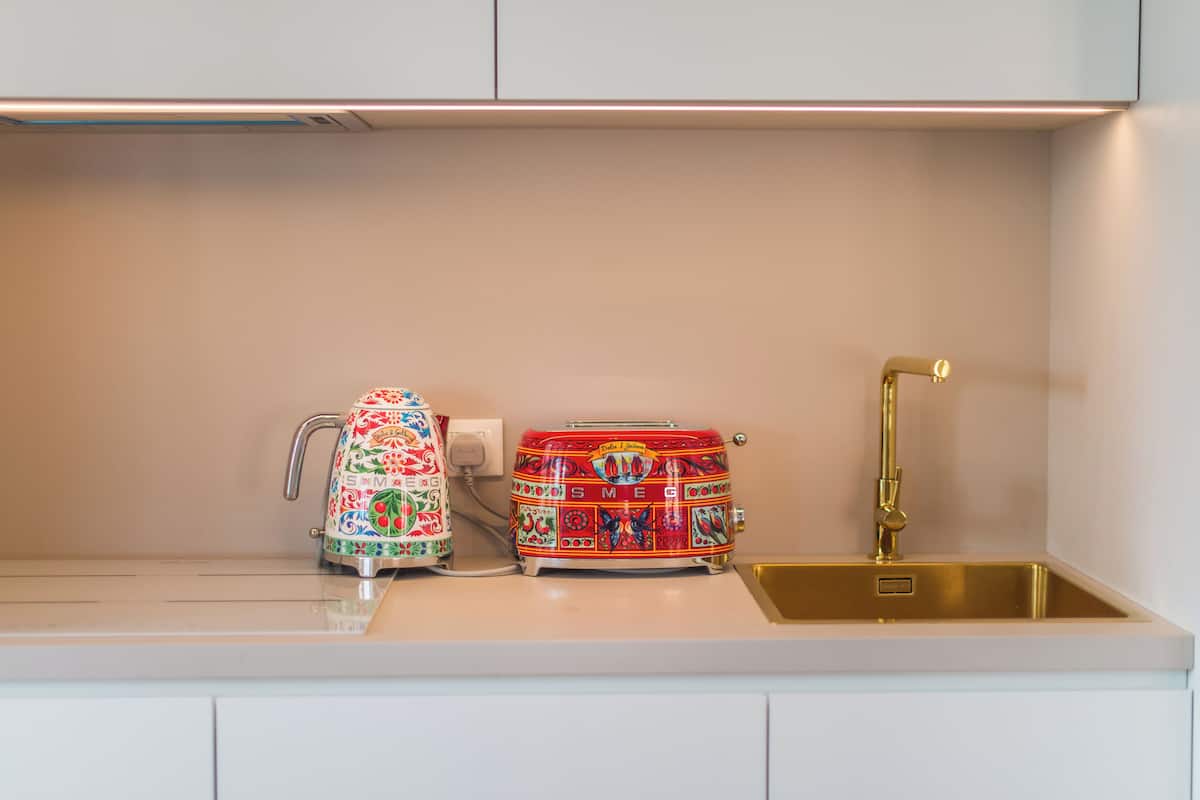 espresso maker, coffee/tea maker, electric kettle, high chair