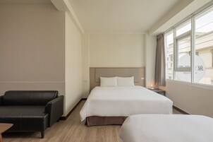 Standard Triple Room, Non Smoking | Living area | LCD TV