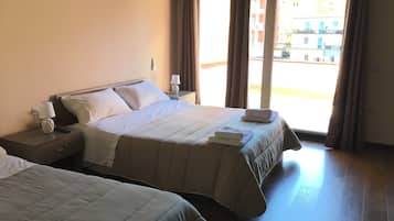 Deluxe Triple Room, Terrace | Pillowtop beds, individually furnished, desk, soundproofing