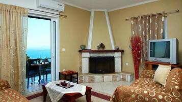 Apartment, 2 Bedrooms | Living room | Flat-screen TV