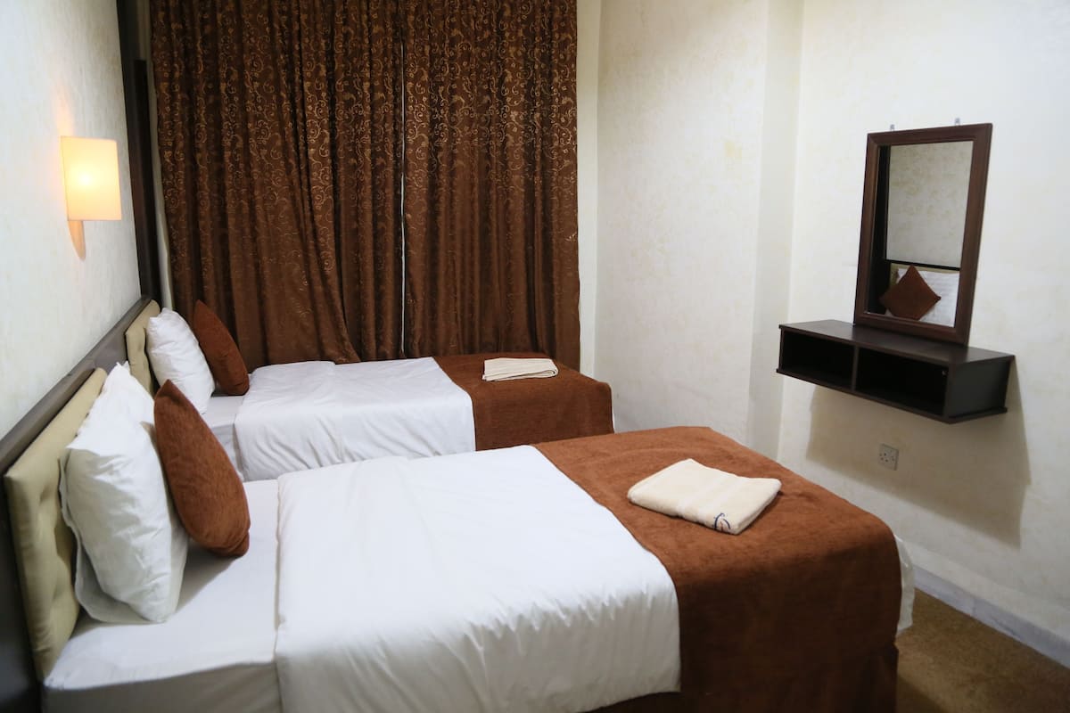 Twin Room | Blackout drapes, soundproofing, iron/ironing board (on request)
