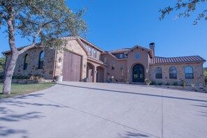 Front with three car garage view