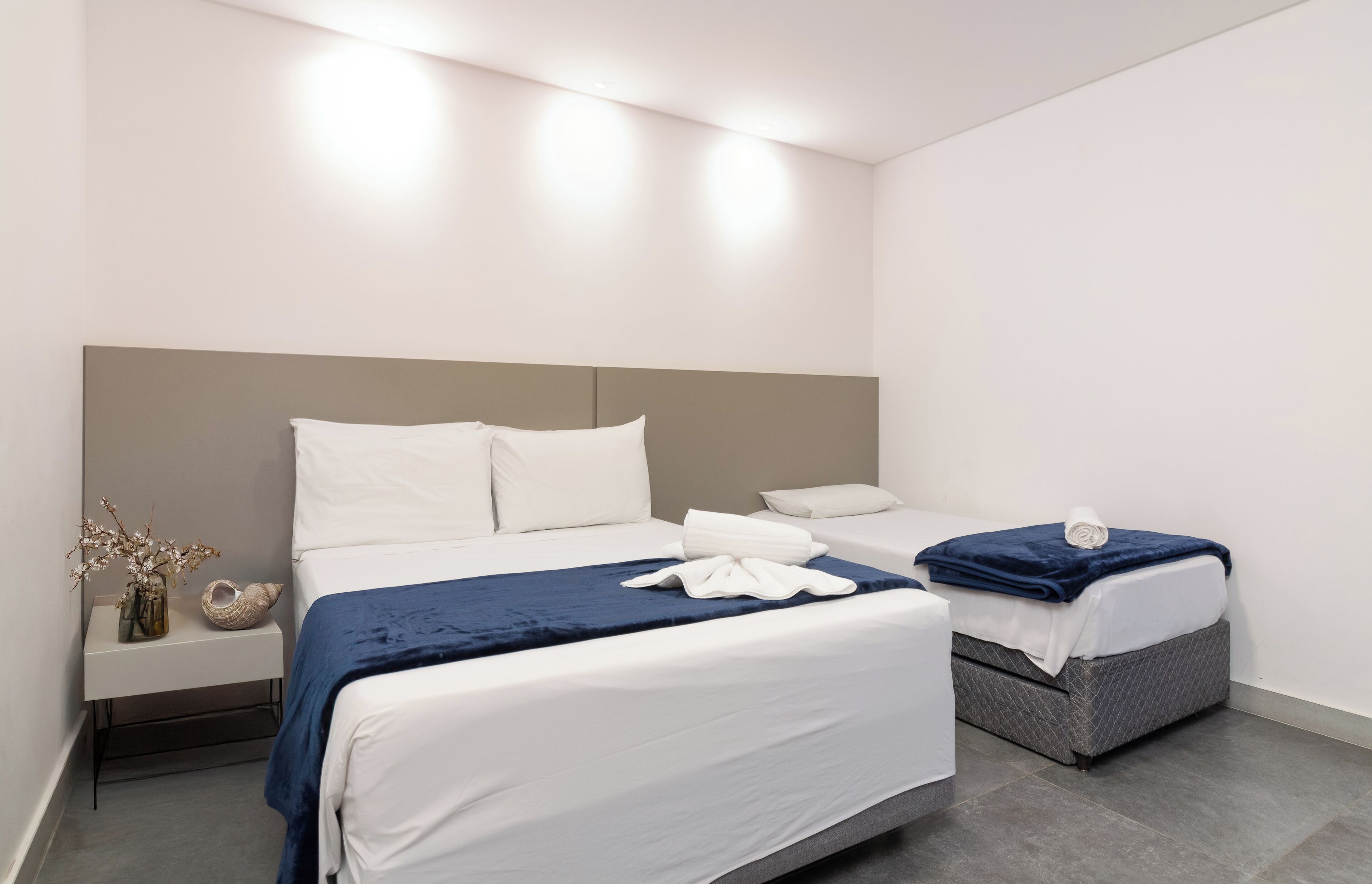 superior triple room | minibar, desk, laptop workspace, blackout curtains