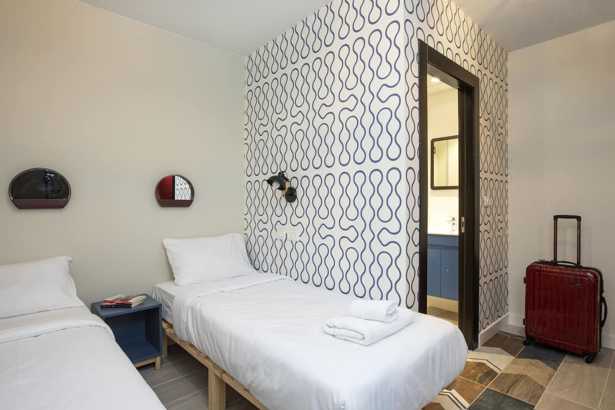 Twin Room | Desk, blackout drapes, free WiFi, bed sheets