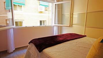 2 dormitorios, tabla de planchar con plancha, wifi gratis y ropa de cama