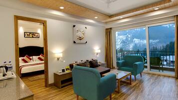 Suite Presidenziale, balcone | Area soggiorno | TV LED 50 pollici con canali via cavo