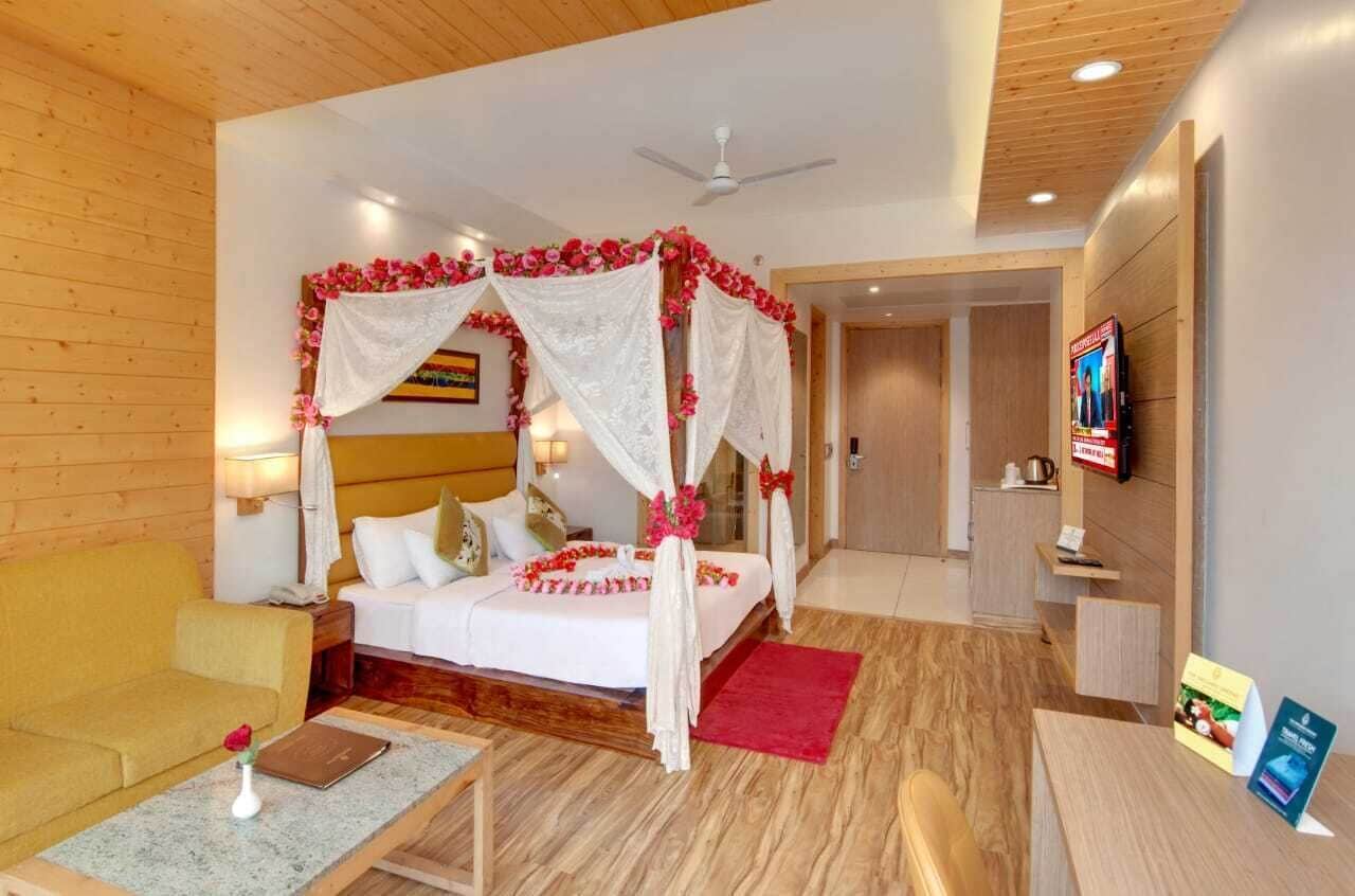 Habitación doble de luna de miel | Ropa de cama de alta calidad y minibar 