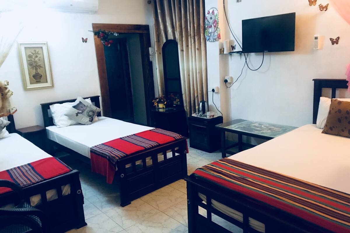 Family Room, Multiple Beds, Non Smoking | In-room safe, desk, soundproofing, iron/ironing board