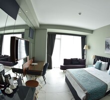 Egyptian cotton sheets, premium bedding, down comforters, minibar