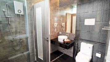 Shower, free toiletries, hair dryer, slippers