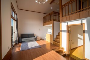 Family Suite, 3 Bedrooms | Living area | 30-inch LCD TV with cable channels, TV
