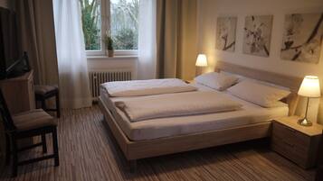 Habitació doble, amb bany privat | Caixa forta a l'habitació, wifi gratuïta i roba de llit