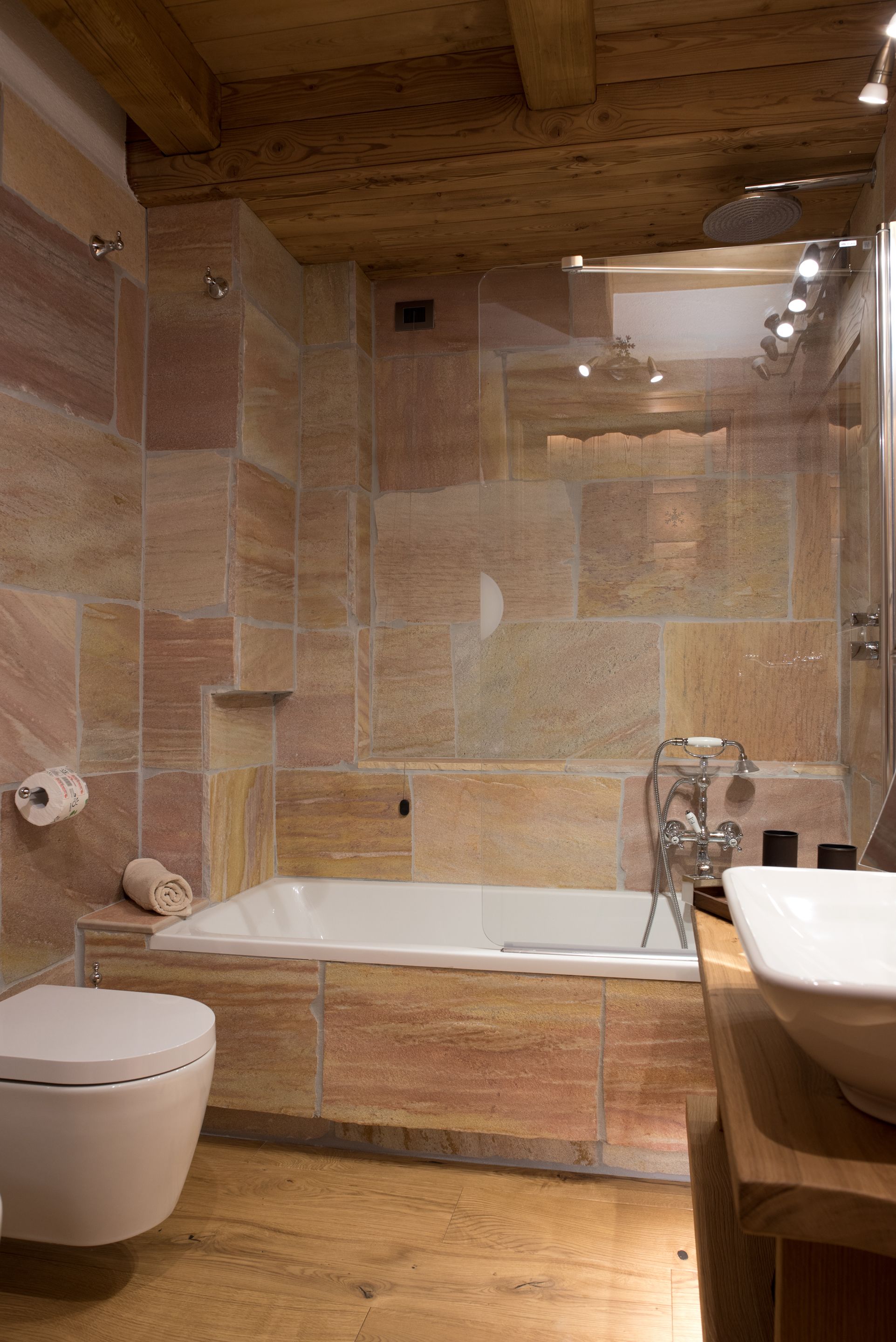 spring water bathtub, rainfall showerhead, free toiletries, hair dryer