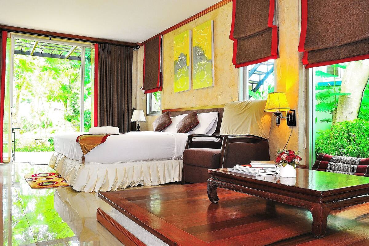 deluxe double room with garden view | blackout curtains, free wifi, bed sheets