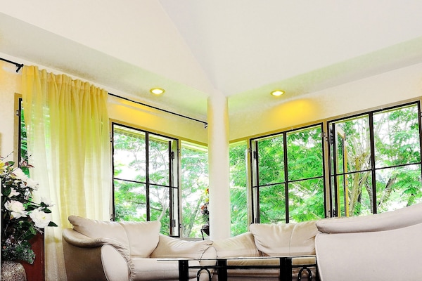 3-Bedroom House | Living area | Flat-screen TV