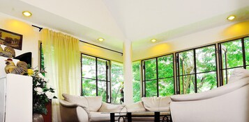 3-Bedroom House | Living area | Flat-screen TV