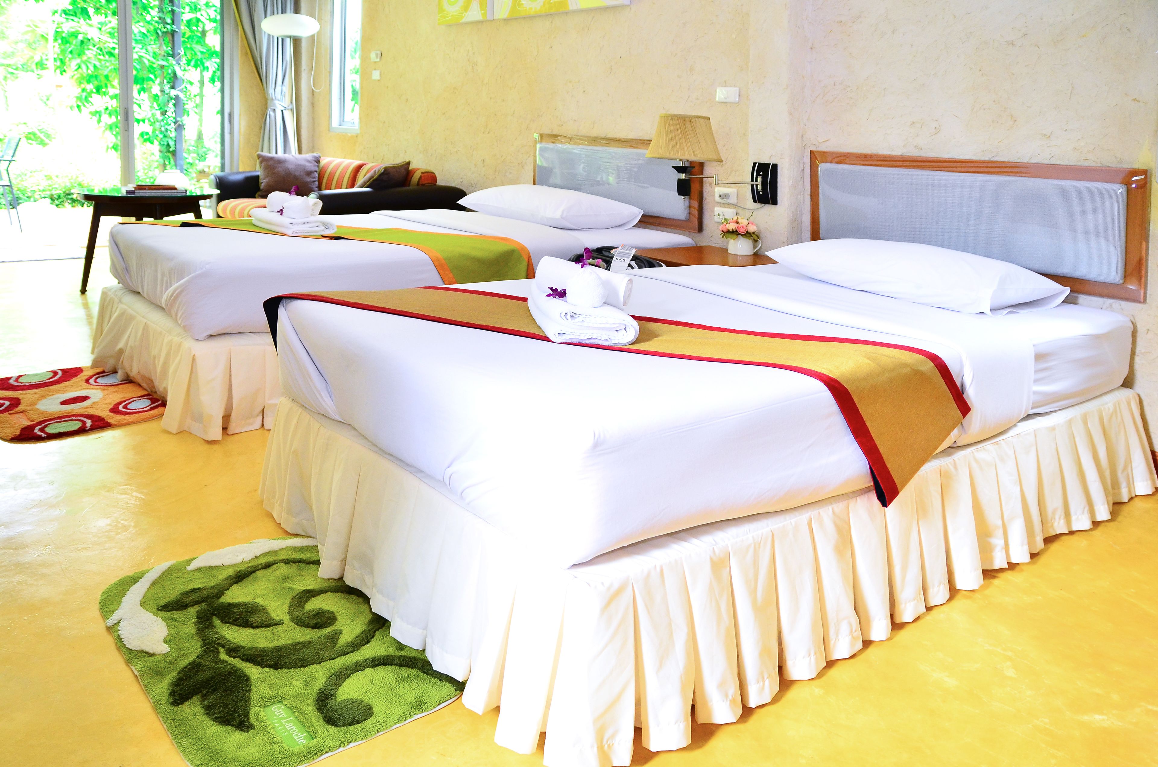 deluxe twin room | blackout curtains, free wifi, bed sheets