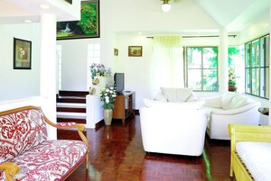 3-Bedroom House | Living area | Flat-screen TV
