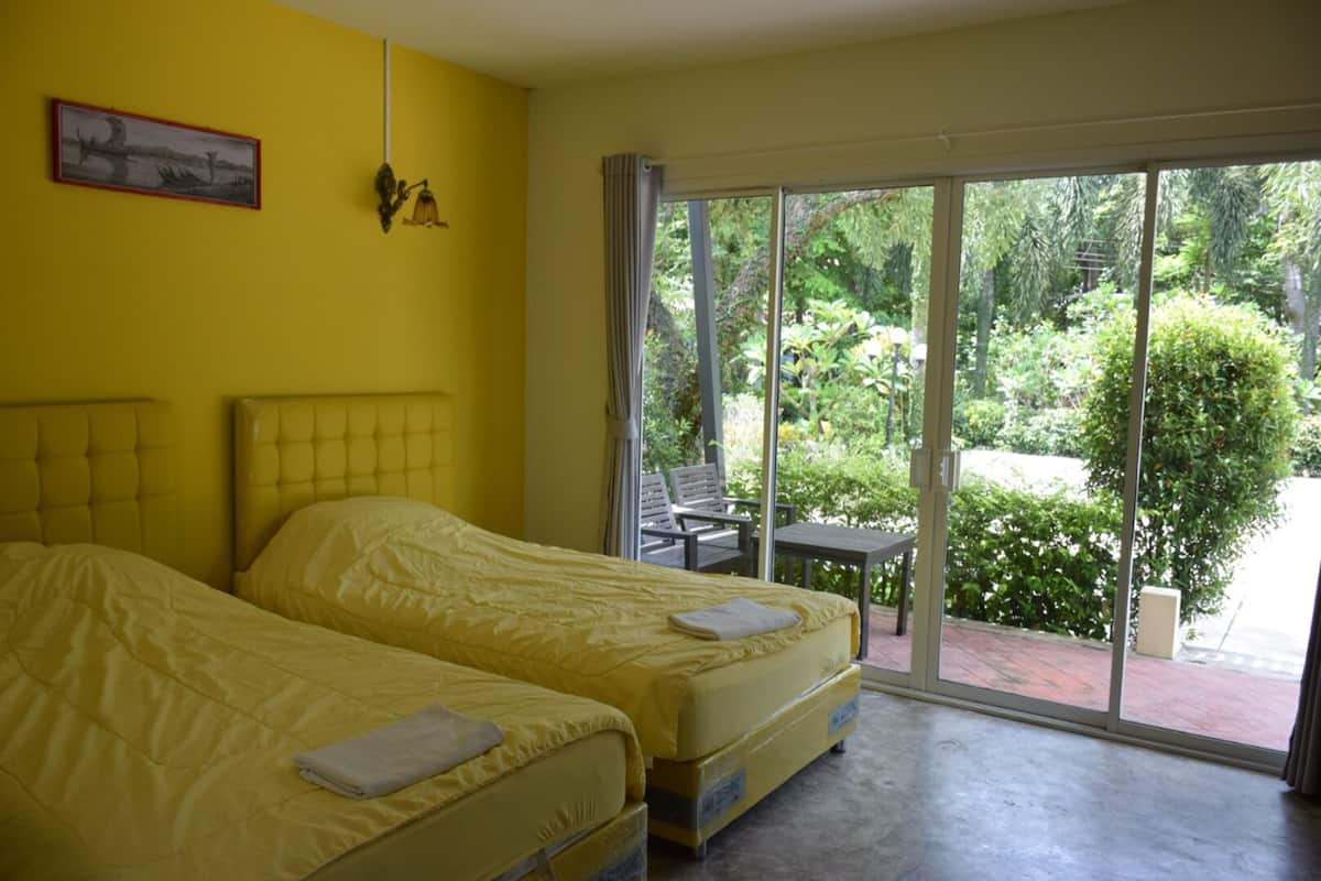 Standard Room with Garden View | Pimennysverhot, lisÀvuoteet, ilmainen Wi-Fi