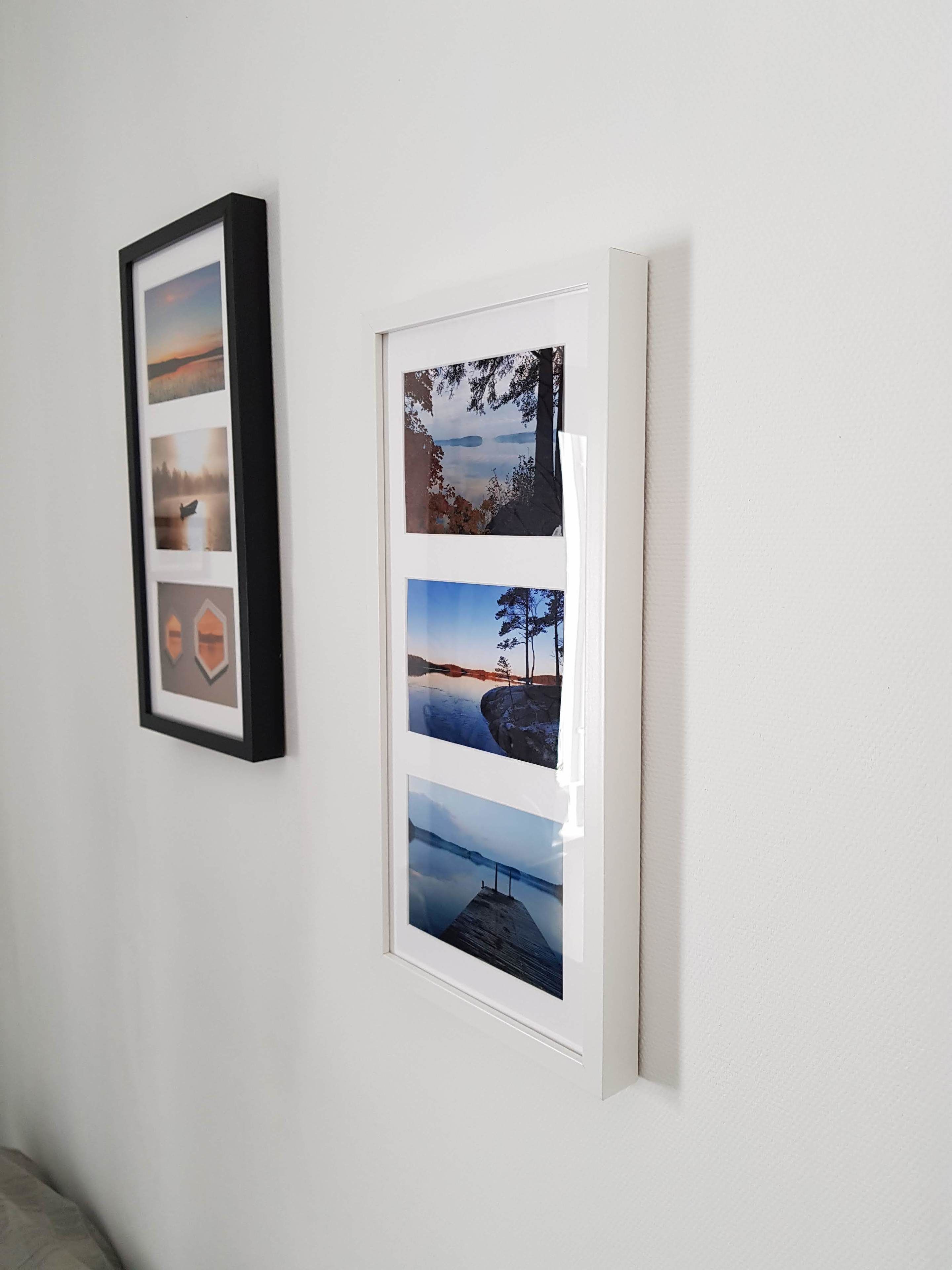 Two framed photographs on a white wall.