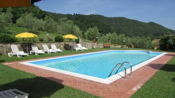 Seasonal outdoor pool, open 9 AM to 8 PM, pool umbrellas, sun loungers