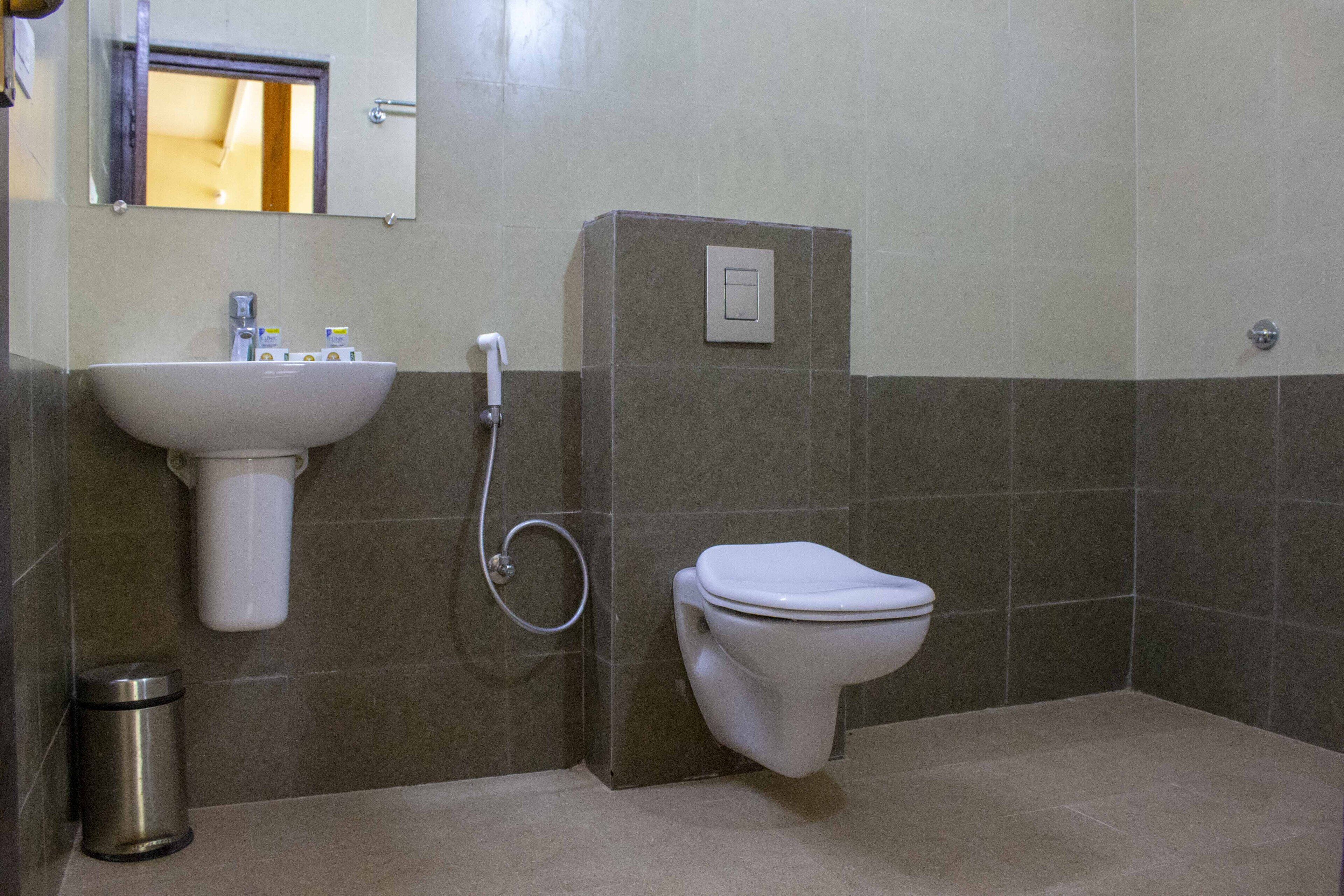 Shower, free toiletries, slippers, towels