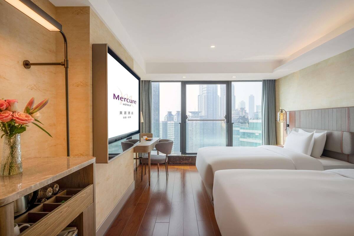 Premium bedding, down comforters, in-room safe, desk