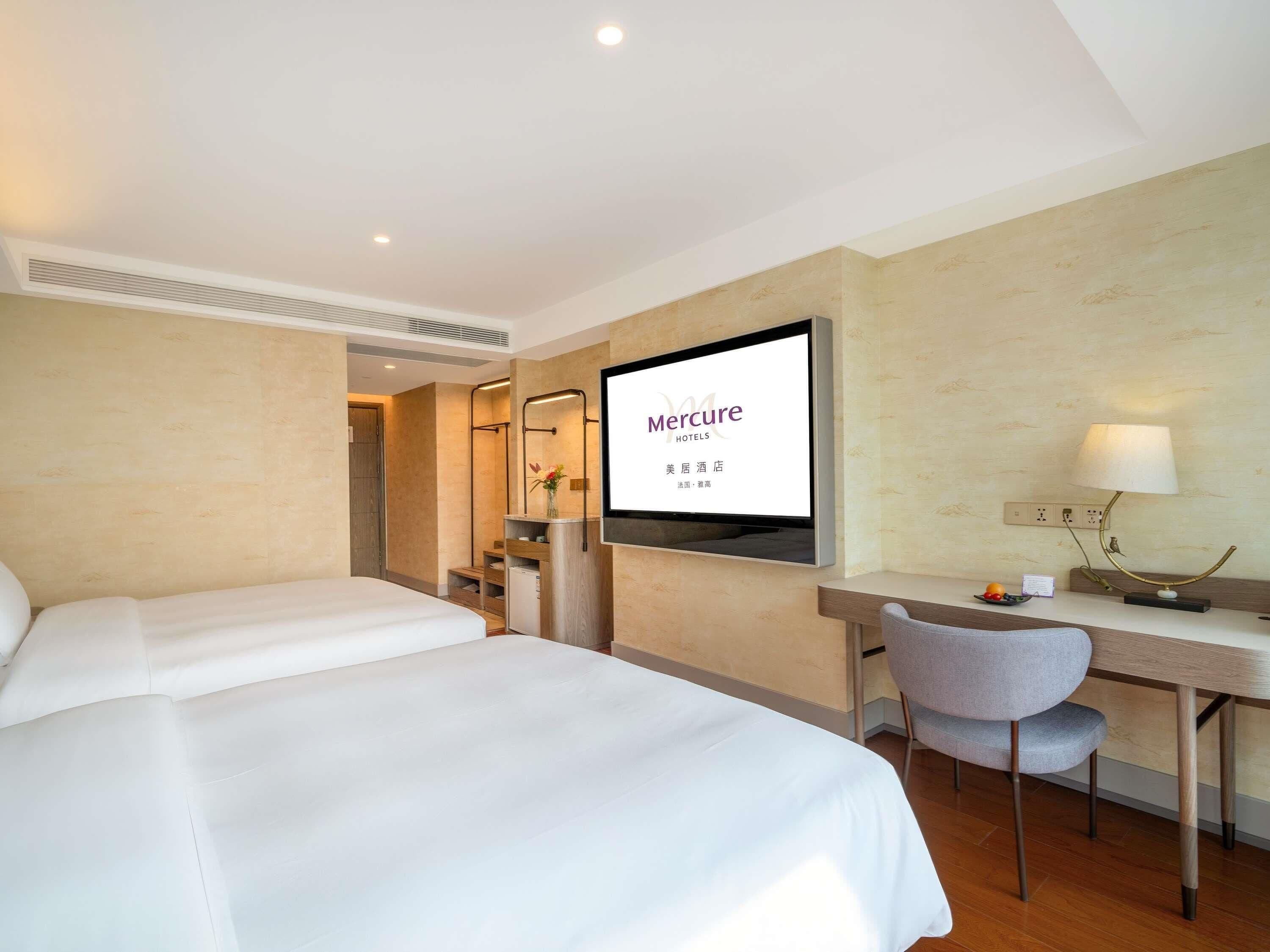 Premium bedding, down duvets, in-room safe, desk