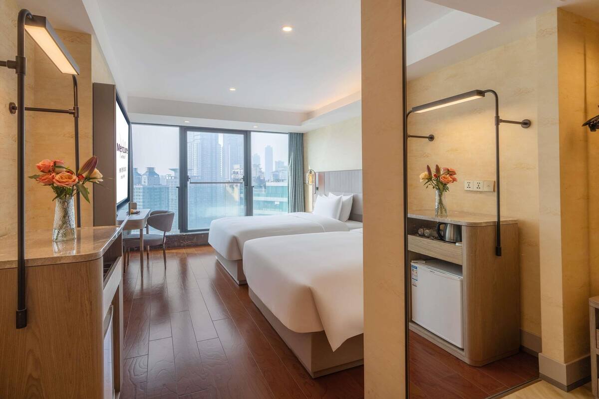 Premium bedding, down comforters, in-room safe, desk