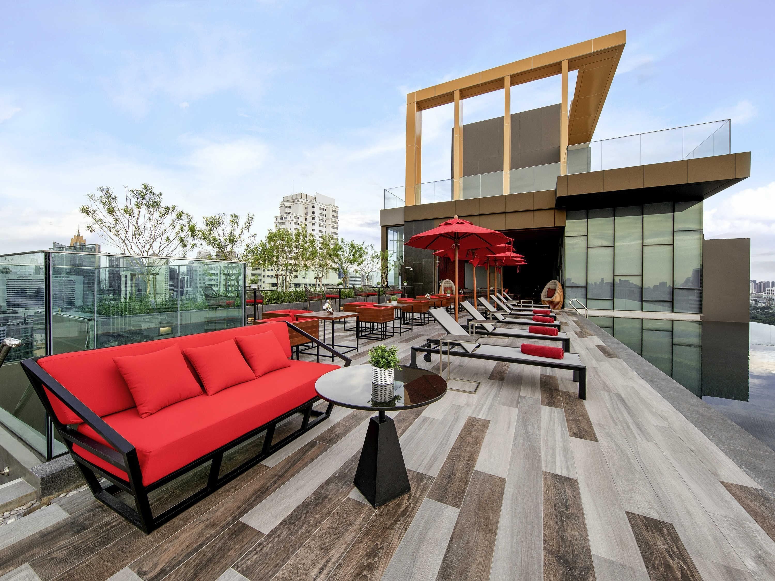 outdoor pool, pool umbrellas, pool loungers