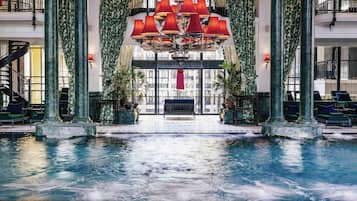 Indoor pool, open 6:00 AM to 9:00 PM, pool loungers