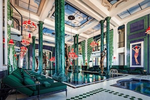 Indoor pool, open 6:00 AM to 9:00 PM, pool loungers