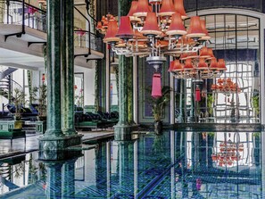 Indoor pool, open 6:00 AM to 9:00 PM, pool loungers