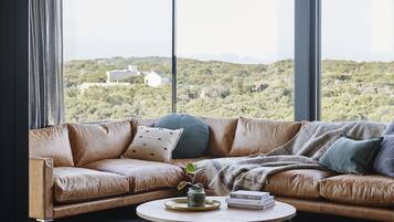 Suite Premium, 1 trĂšs grand lit, cheminĂ©e, vue ocĂ©an (Alto) | Vue sur la plage/lâocĂ©an