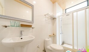 Shower, free toiletries, hair dryer, slippers