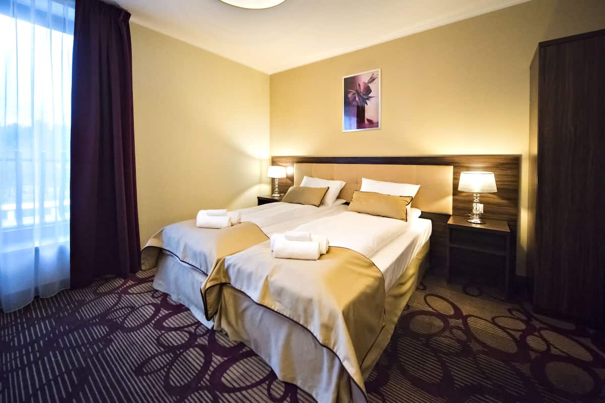 In-room safe, blackout drapes, iron/ironing board (on request)