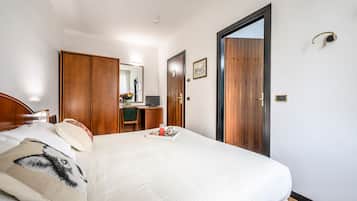 Economy Double Room, 1 Queen Bed | Minibar, in-room safe, desk, laptop workspace