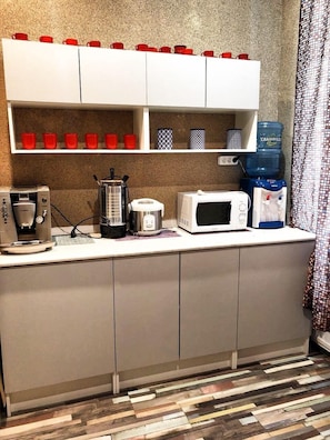 Fridge, microwave, stovetop, cookware/dishes/utensils