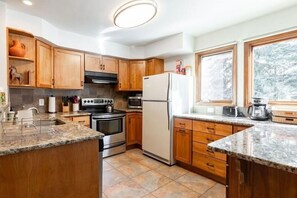 Townhome, 3 Bedrooms | Private kitchen | Fridge, oven, coffee/tea maker, toaster - Townhome with Covered Parking Space & Fireplace by RedAwning (Vail)