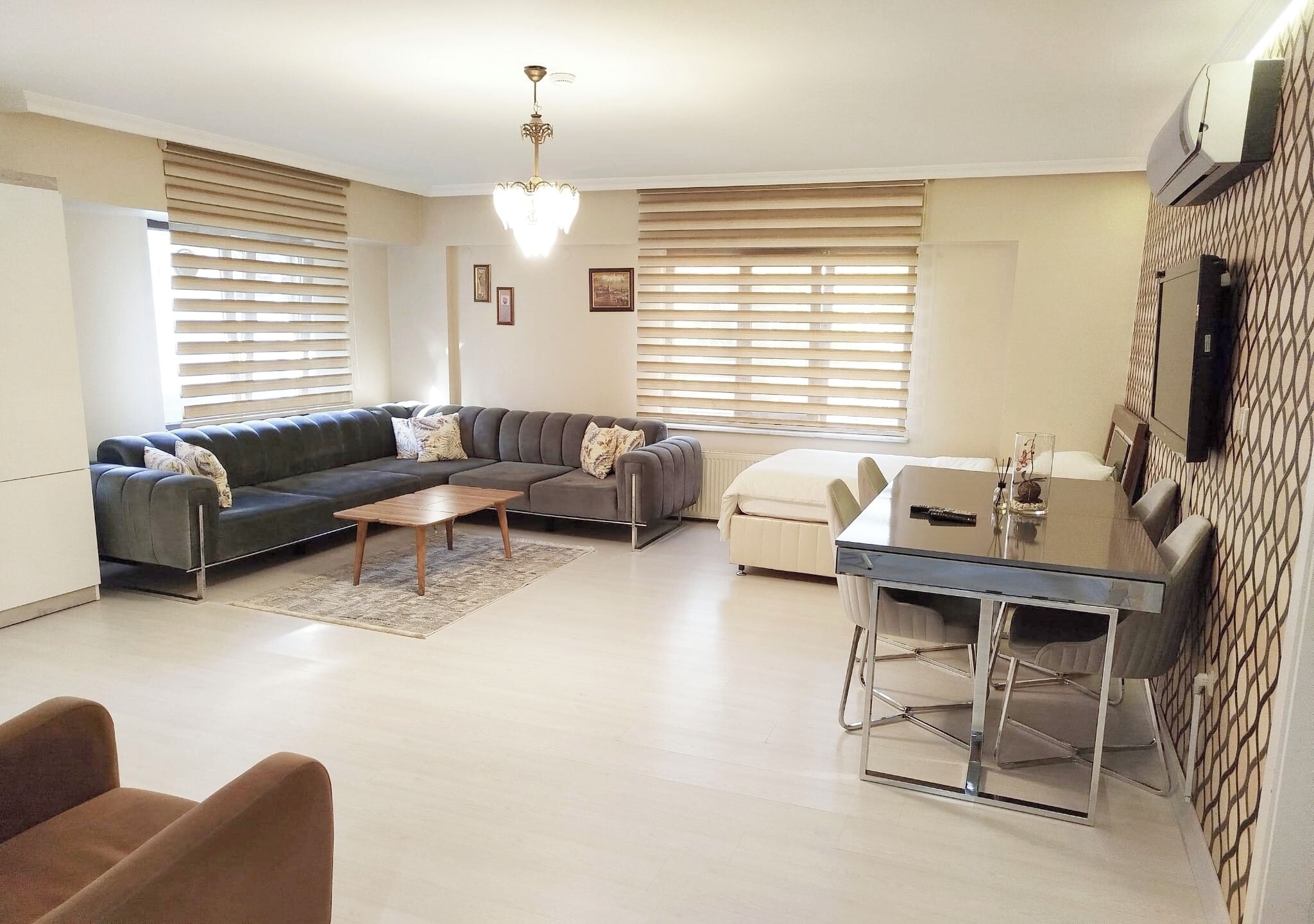 Standard Apartment, 3 Bedrooms, Courtyard View | Living area | LCD TV
