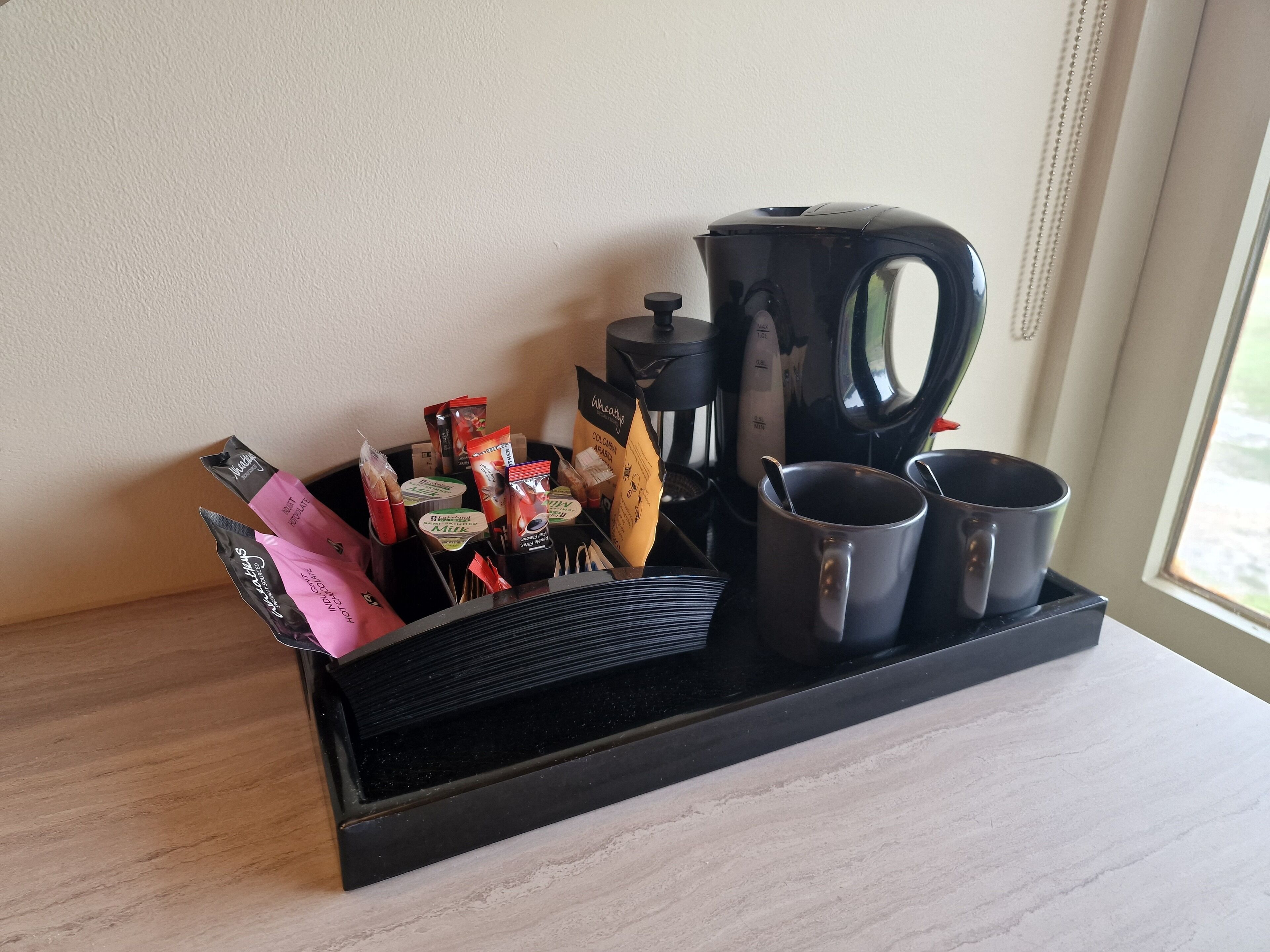 individually decorated, individually furnished, laptop workspace