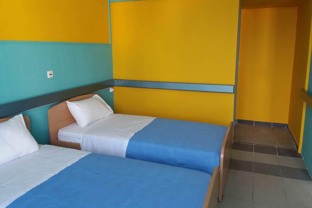 Blackout drapes, iron/ironing board, free WiFi, bed sheets