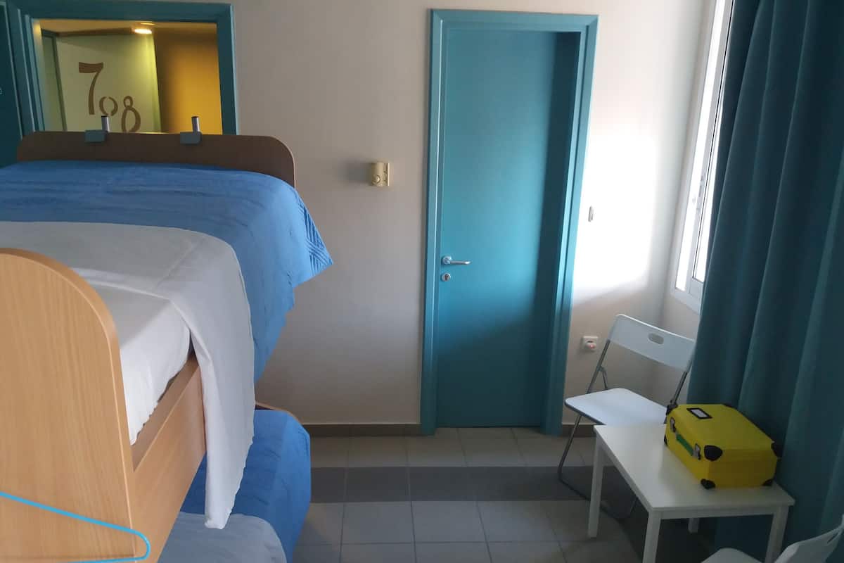 Blackout drapes, iron/ironing board, free WiFi, bed sheets
